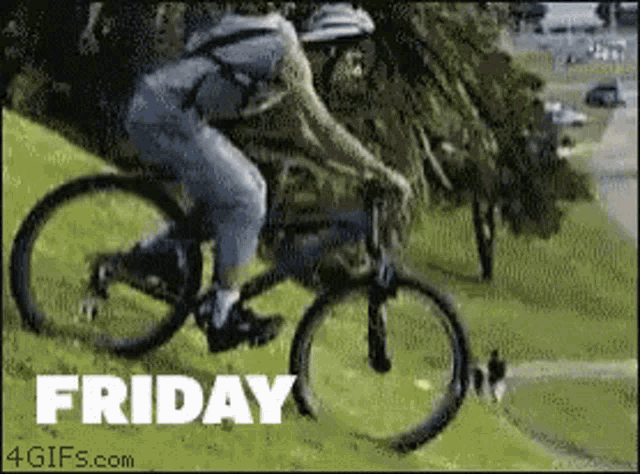 a man is riding a bike on a grassy hill with the words friday written below him
