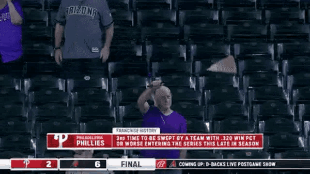 a philadelphia phillies game is being shown on a tv screen