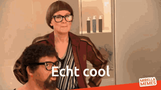 a woman with glasses stands next to a man with a beard and the words echt cool on the bottom