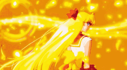 a girl with long yellow hair and a red bow in her hair