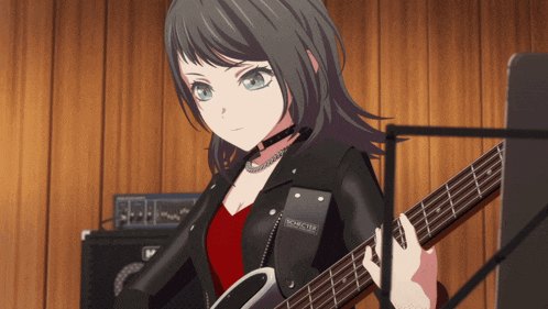 a girl playing a guitar with a black jacket that says monster on it