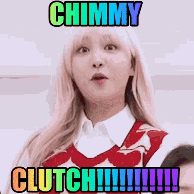 a girl with blonde hair is making a funny face with the words chimmy clutch written above her