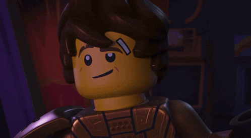 a close up of a lego character 's face with a sad look on his face