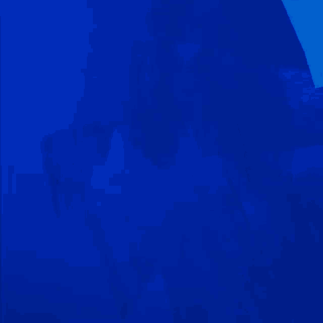a blue background with a silhouette of a person