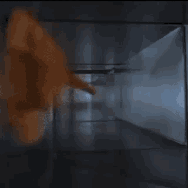 a very dark room with a smoke coming out of it