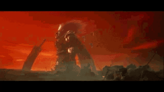 a giant monster with a sword is standing in the middle of a field in a video game .