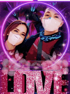 a man and a woman wearing face masks with the word love in the corner