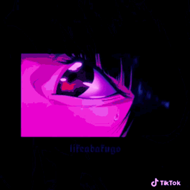 a close up of a person 's face with a purple light behind them .