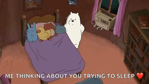 ice bear from we bare bears is standing on a bed in a room .