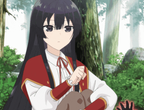a girl with long black hair and a red cape stands in the woods