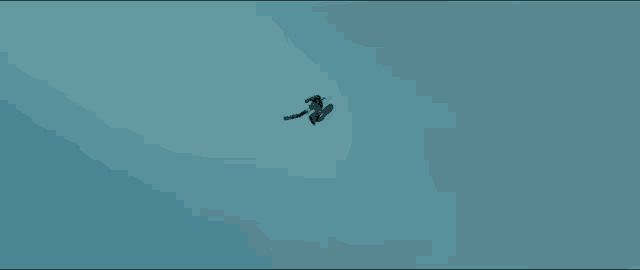 a person in a superhero costume is kicking in the air