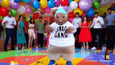 a man wearing a snag gang shirt is dancing in front of a crowd