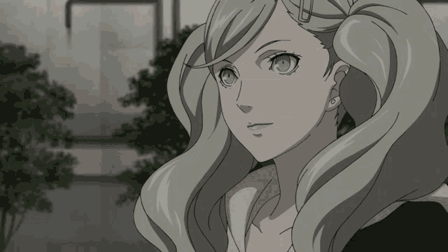 a woman with blonde hair and blue eyes is looking at something