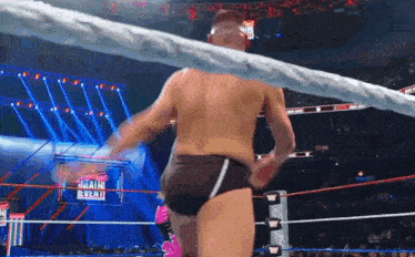 a wrestling ring with a sign that says main event on it