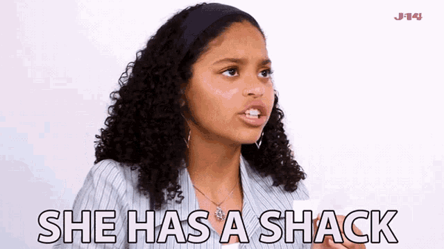 a girl with curly hair says she has a shack in front of a white background
