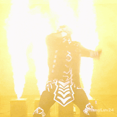 a man in a skeleton costume stands in front of a yellow background with the number 24 on it