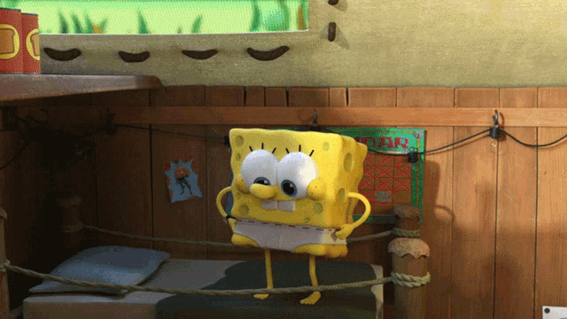 a cartoon spongebob is standing on a bed in a room