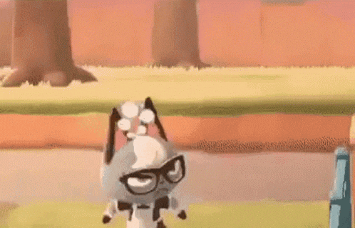 a cat wearing glasses and a hat is standing in a field .