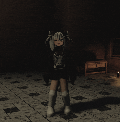 a girl wearing a black shirt with a skull and wings on it