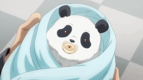 a baby panda bear wrapped in a blue blanket