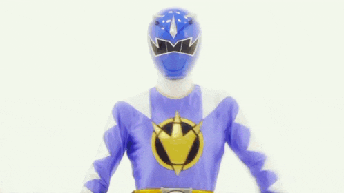 a purple power ranger is giving a thumbs up sign