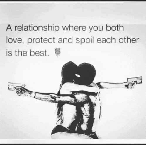 a couple is hugging each other with guns in their hands .