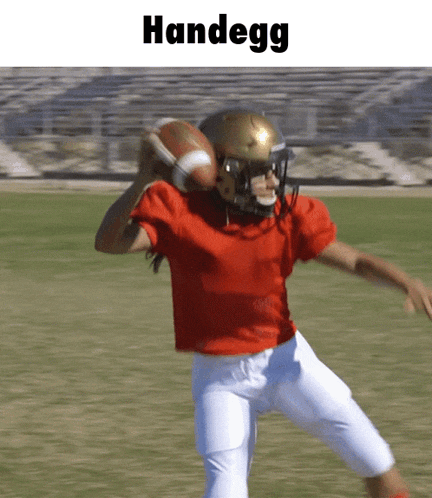 a football player in a red shirt and white shorts is throwing a ball and the word handegg is above him