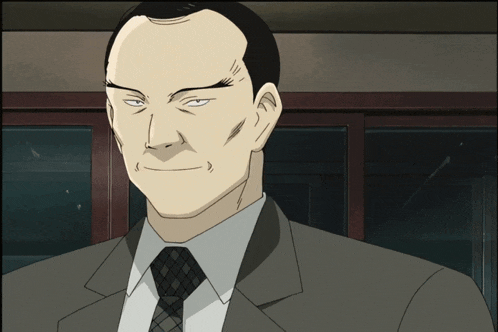 a man in a suit and tie is smiling