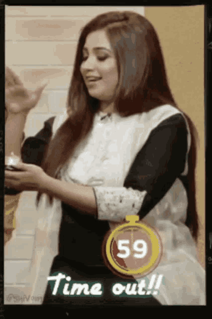 a picture of a woman with a 59 second timer behind her