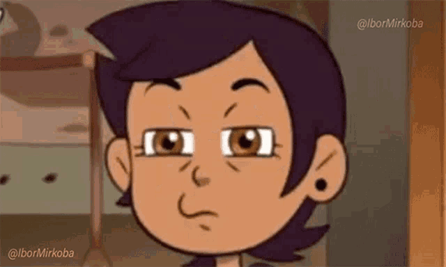 a close up of a cartoon character 's face with a serious look on her face .