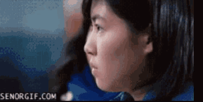 a close up of a woman 's face with senorgif.com in the lower right corner