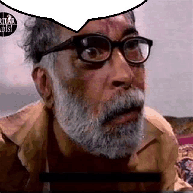 a man with glasses and a beard is talking to someone