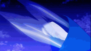 a blue and white umbrella is flying in the air