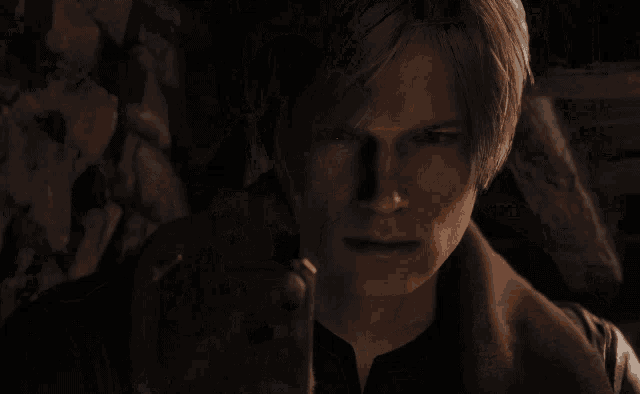 a close up of a person 's face with a brown jacket