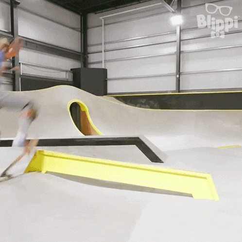 a person riding a skateboard on a ramp with the word blippi on the bottom