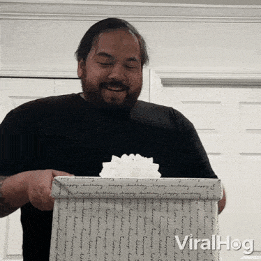 Opening A Present Viralhog GIF - Opening A Present Viralhog Surprise Gift GIFs