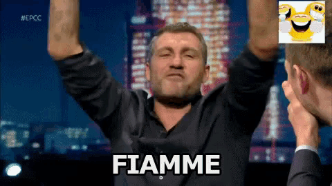 a man with his arms in the air and the word fiamme on the bottom