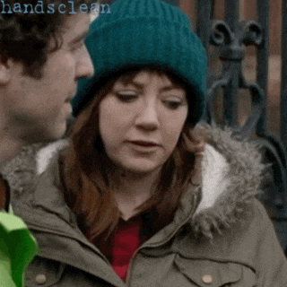a man and a woman are looking at each other and the words handsclean are on the bottom right