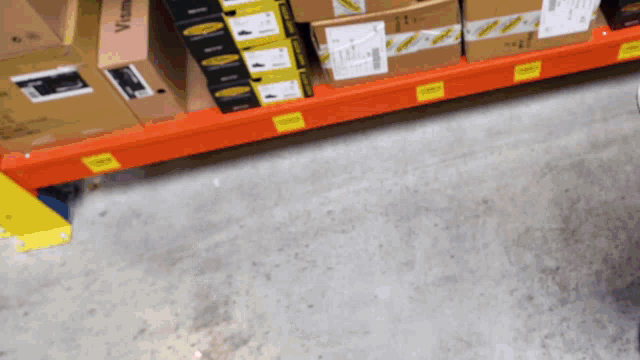 a row of boxes on a shelf with one labeled visa