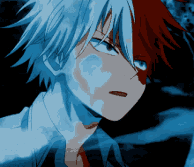 a close up of a anime character with red and blue hair