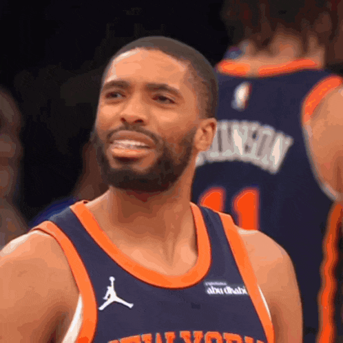 a basketball player wearing a jersey that says johnson on it
