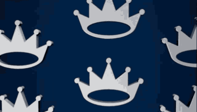 a blue background with a pattern of white crowns on it