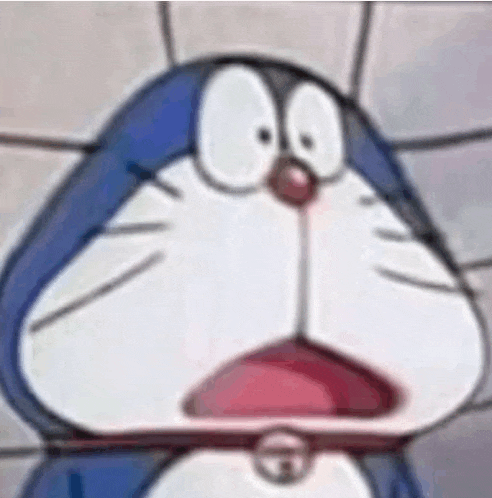 a close up of a cartoon character 's face with a surprised look on his face .