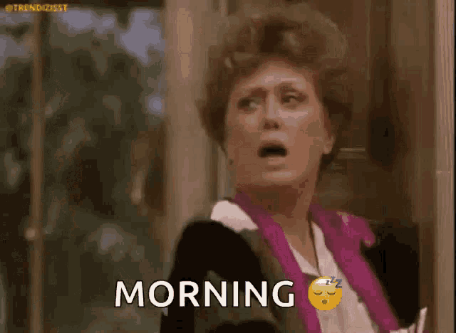 a woman is making a funny face and saying `` morning '' with a sleeping emoji .