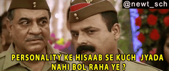 two men in military uniforms are looking at each other and the caption says personality ke hisaab se kuch jyada nahi bol raha ye
