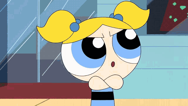 bubbles from the powerpuff girls has her arms crossed and a surprised look on her face