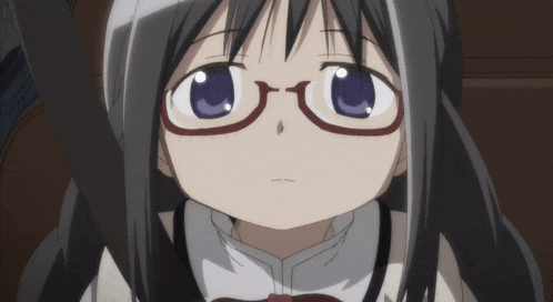 a close up of a girl wearing glasses and a bow tie