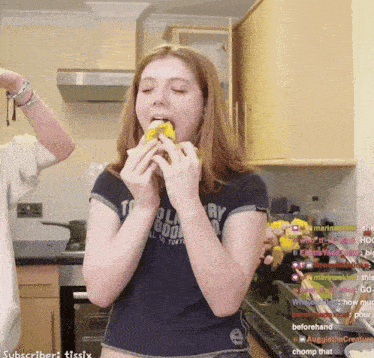 a girl wearing a t-shirt that says today on it eating a banana