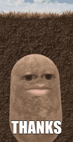 a potato in the dirt with the words thanks written on it