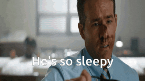a man with blood on his face and the words he 's so sleepy